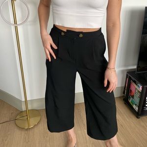 Black ankle length trousers